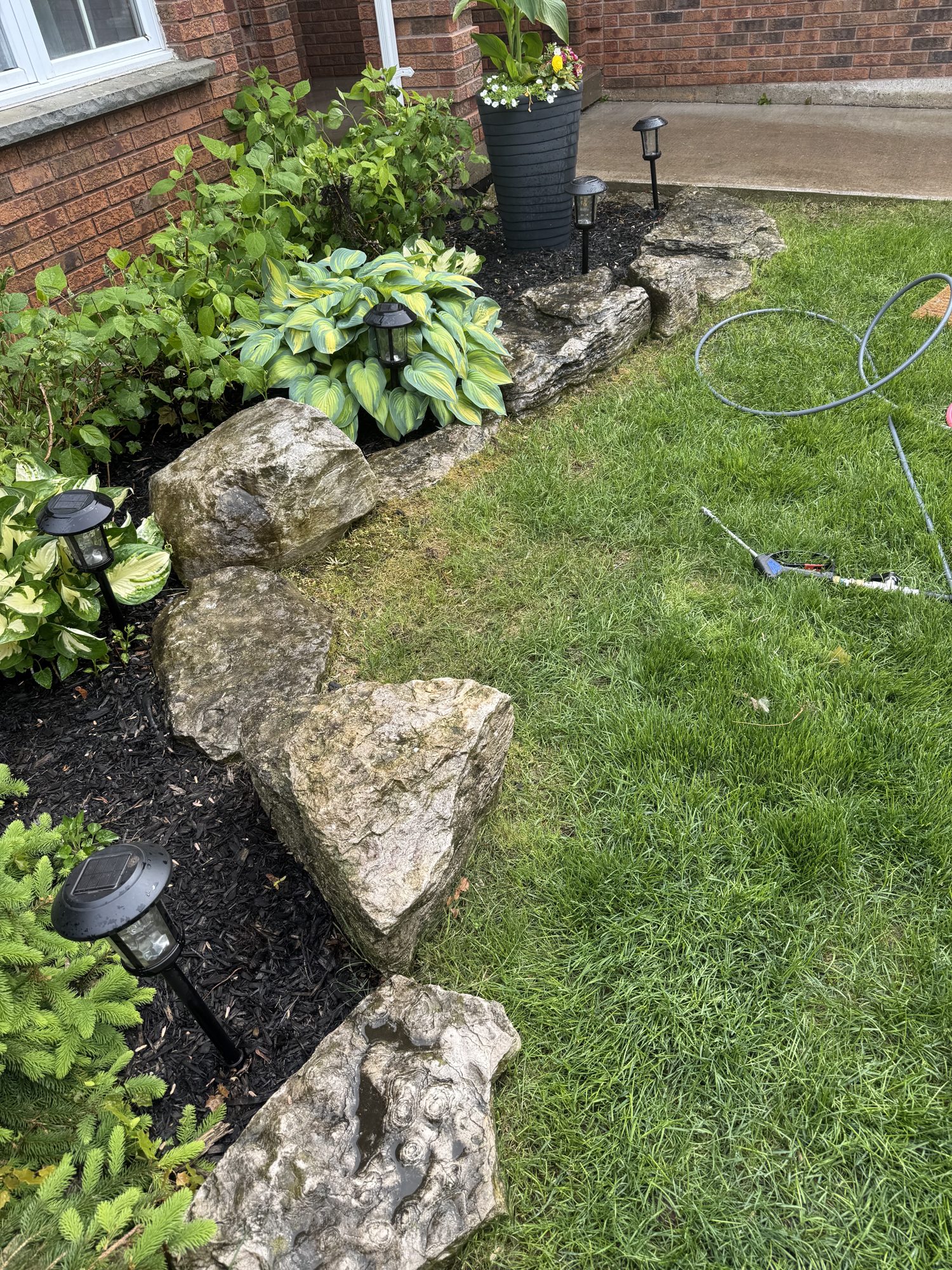 Rock edging before Imperial Cleaning service
